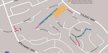 Rainbow route winding through a residential street map with labeled roads, including Veronica Way and Toledo Way.