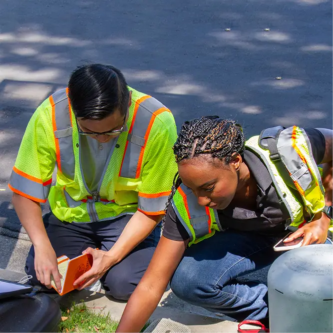 water efficiency experts checking water meter